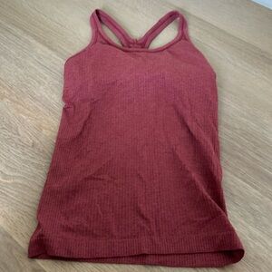 No tag - fits like a small!